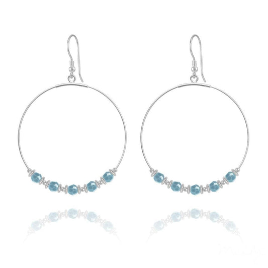 Large sterling silver hoop earrings with genuine turquoise Swarovski crystals, silver spacers and earwire hooks