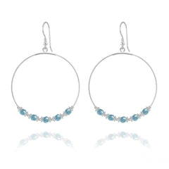 Large sterling silver hoop earrings with genuine turquoise Swarovski crystals, silver spacers and earwire hooks