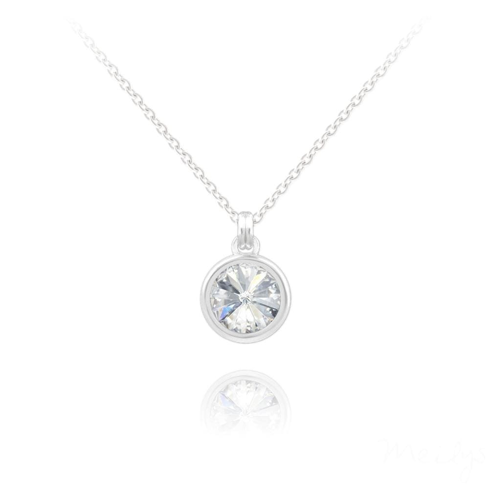 Sterling Silver bezel set white crystal drop necklace with rhodium plated finish