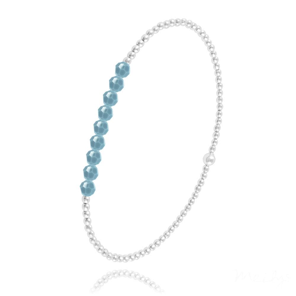 Sterling silver stretch bracelet with faceted turquoise-coloured beads and polished round silver beads