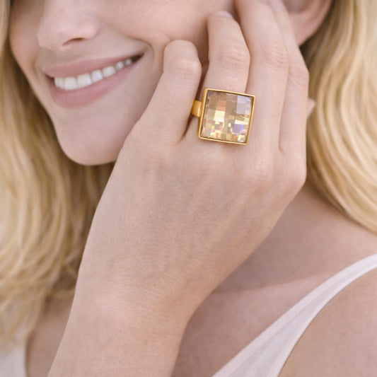 gold square ring with a gemstone