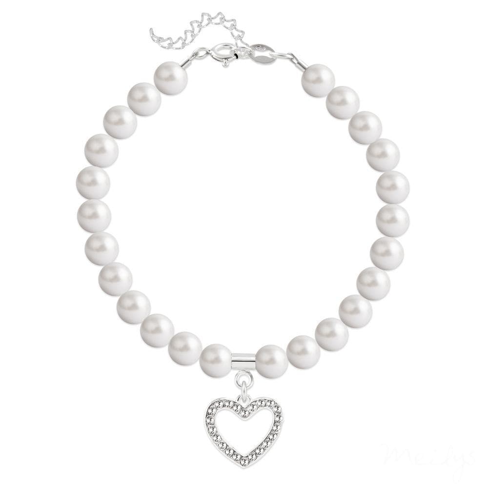 Sterling silver bracelet with white Swarovski crystal pearls, a clear-accented open heart charm and extension chain