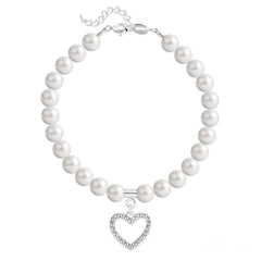 Sterling silver bracelet with white Swarovski crystal pearls, a clear-accented open heart charm and extension chain