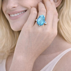 ring with a blue gemstone