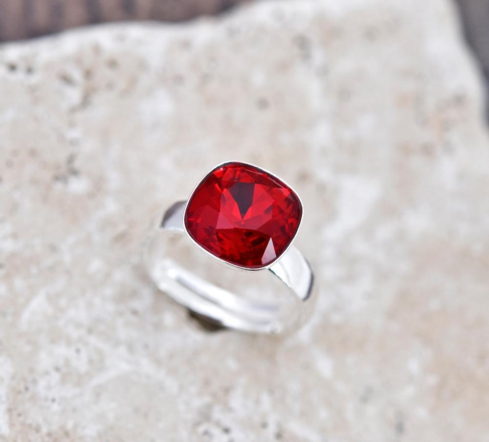 Sterling Silver adjustable ring with Genuine Siam cushion cut red crystal in a bezel setting