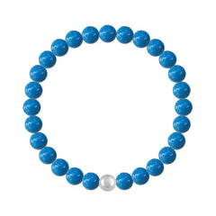Sterling silver stretch bracelet with Genuine Swarovski lapis blue pearls and polished silver accent bead